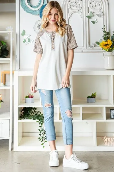 Full Size Animal Print Half Button Short Sleeve Top