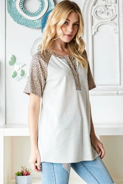Full Size Animal Print Half Button Short Sleeve Top
